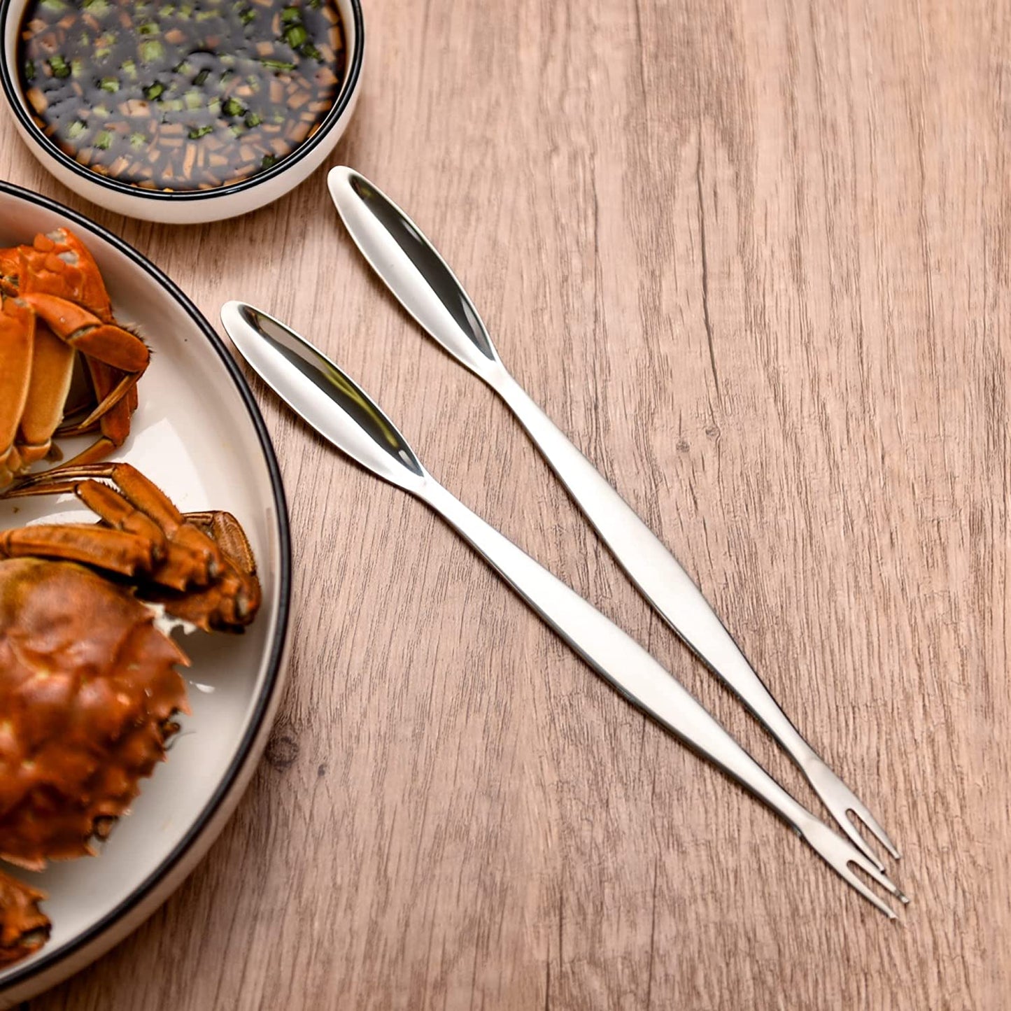 IMEEA Seafood Forks Picks SUS304 Stainless Steel with dual ended design displayed on a dining table