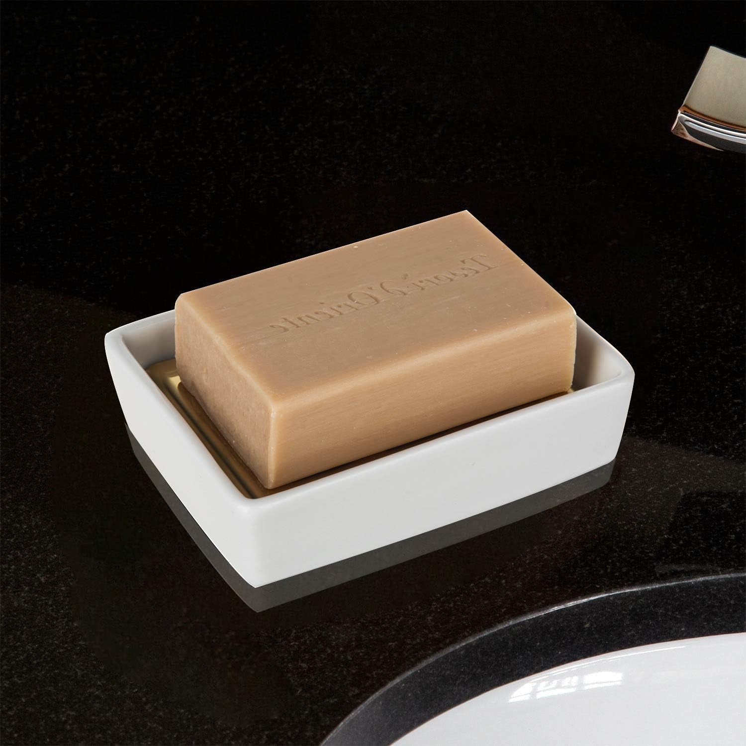 Elegant Gold Stainless Steel Soap Holder with soap on bathroom sink close up