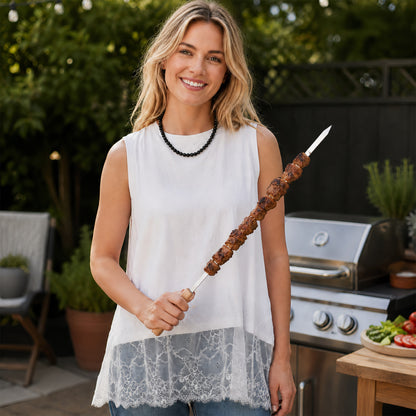 IMEEA reusable flat kebab skewers grilling meat and vegetables on an outdoor BBQ grill
