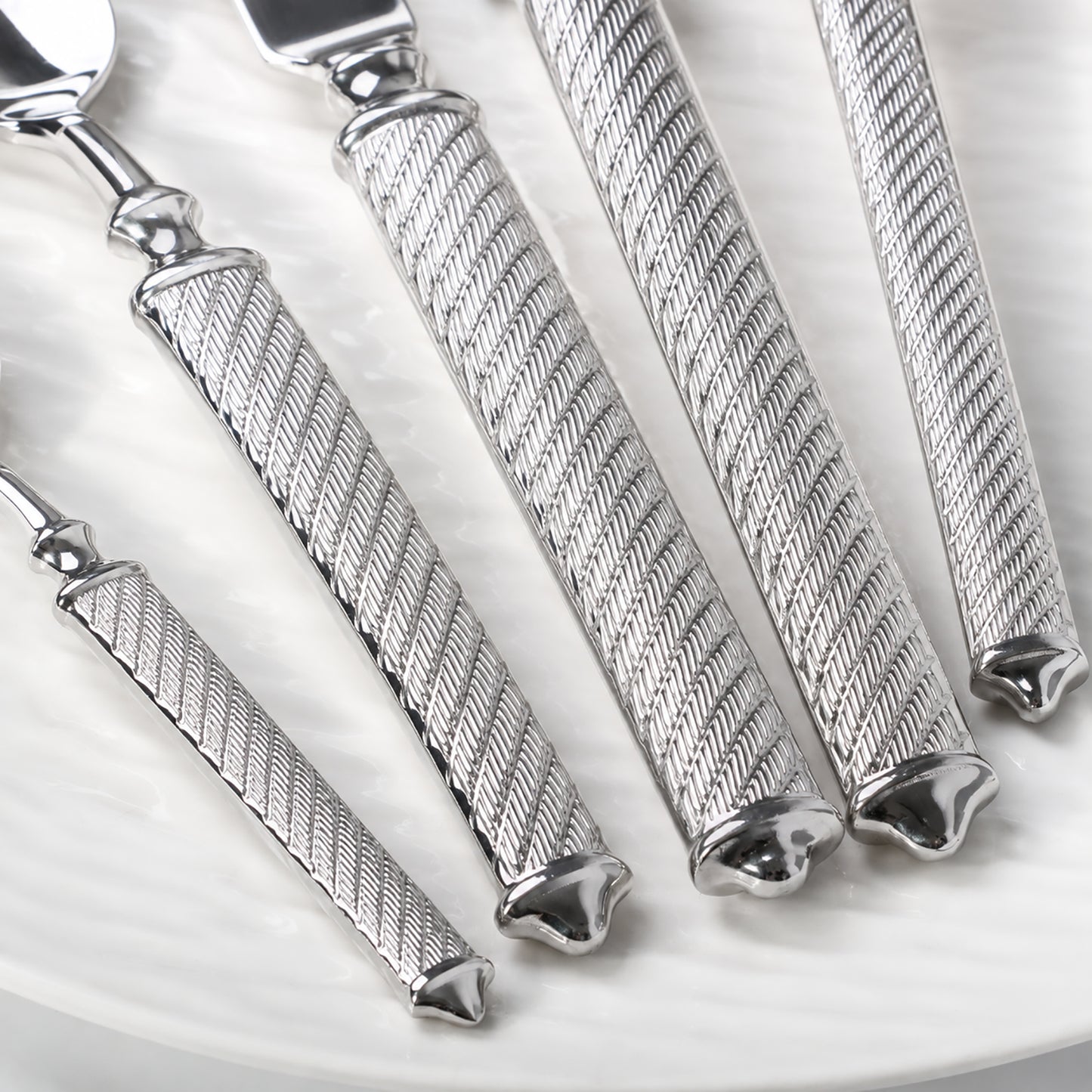 IMEEA Cambridge Textured Flatware Set Detail Showing Decorative Handle End Design with Refined Pattern