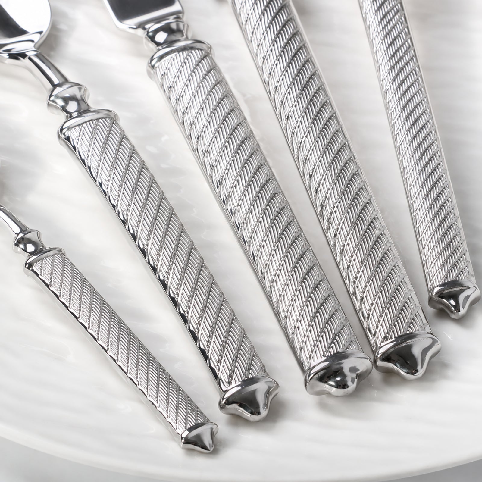 IMEEA Cambridge Textured Flatware Set Detail Showing Decorative Handle End Design with Refined Pattern