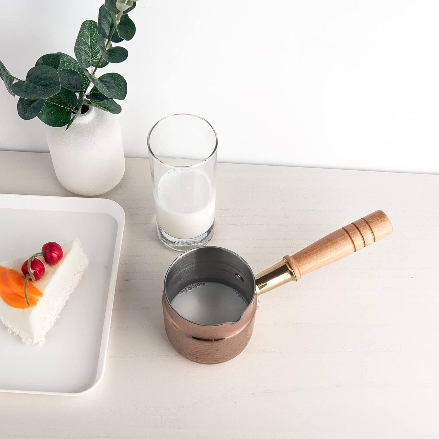 IMEEA Stainless Steel Melting Pot with milk on the table for creating refined breakfast recipes