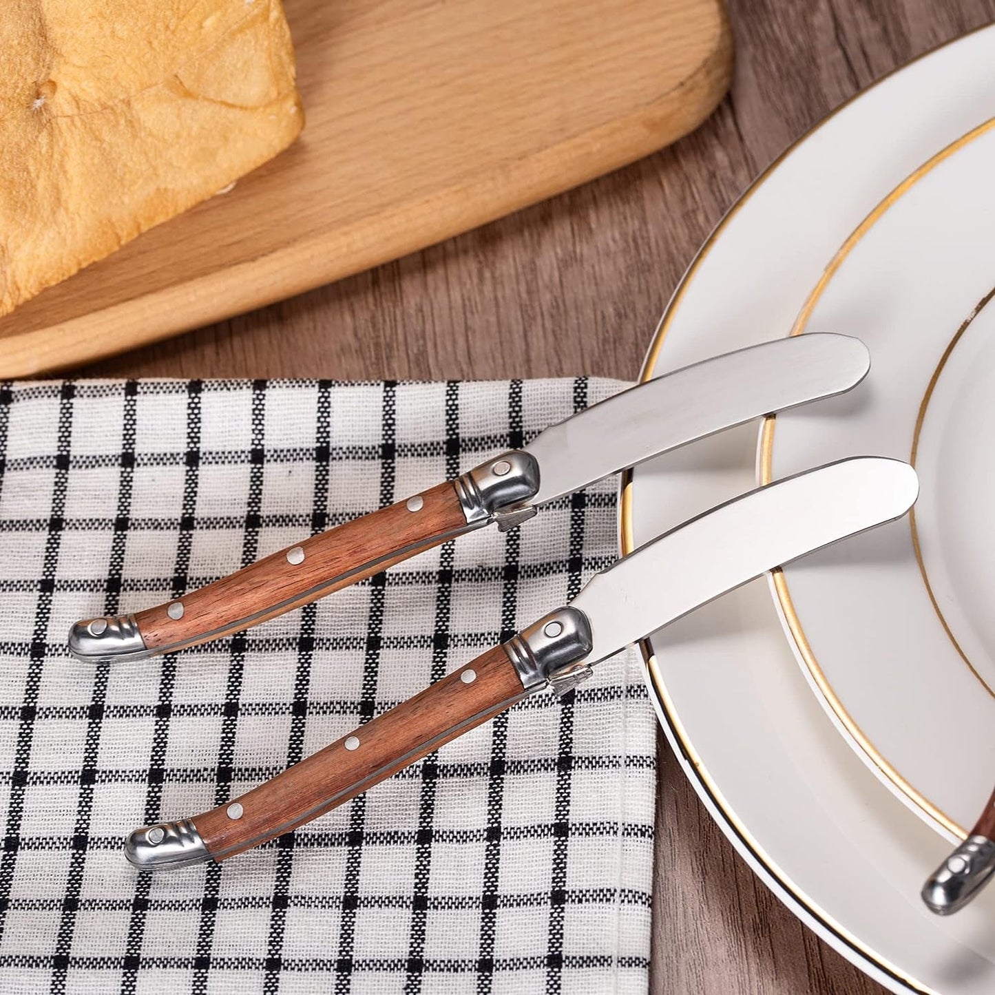 IMEEA jam spreader set placed on the edge of a plate