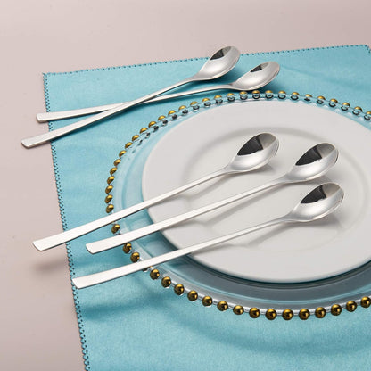 Iced Tea Spoons arranged on a plate with a blue placemat, highlighting the ergonomic long handle design