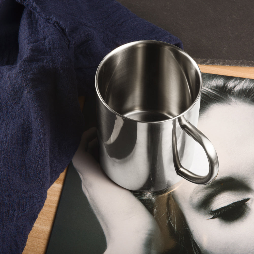 Stainless Steel Double Wall Coffee Mug Close-Up Showing Brushed Texture and Ergonomic Handle for Comfortable Grip