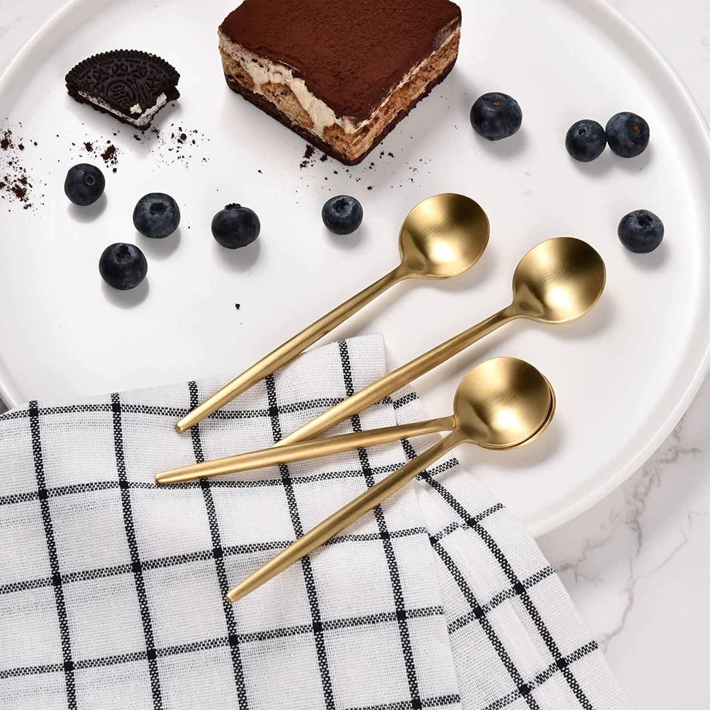 IMEEA Coffee Spoons SUS304 Stainless Steel with matte gold finish displayed on a cake plate