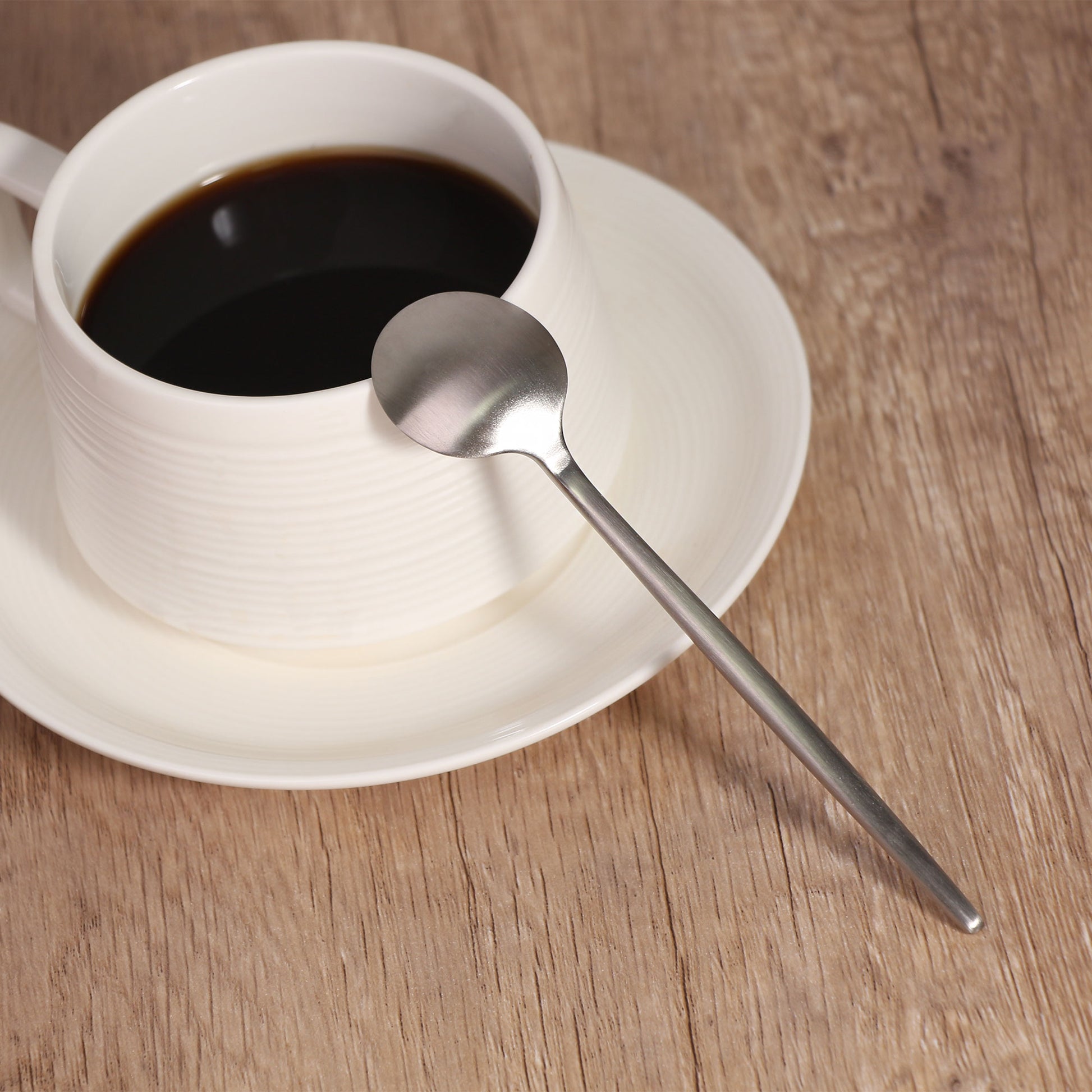 IMEEA Stainless Steel Coffee Spoons displayed with a coffee cup
