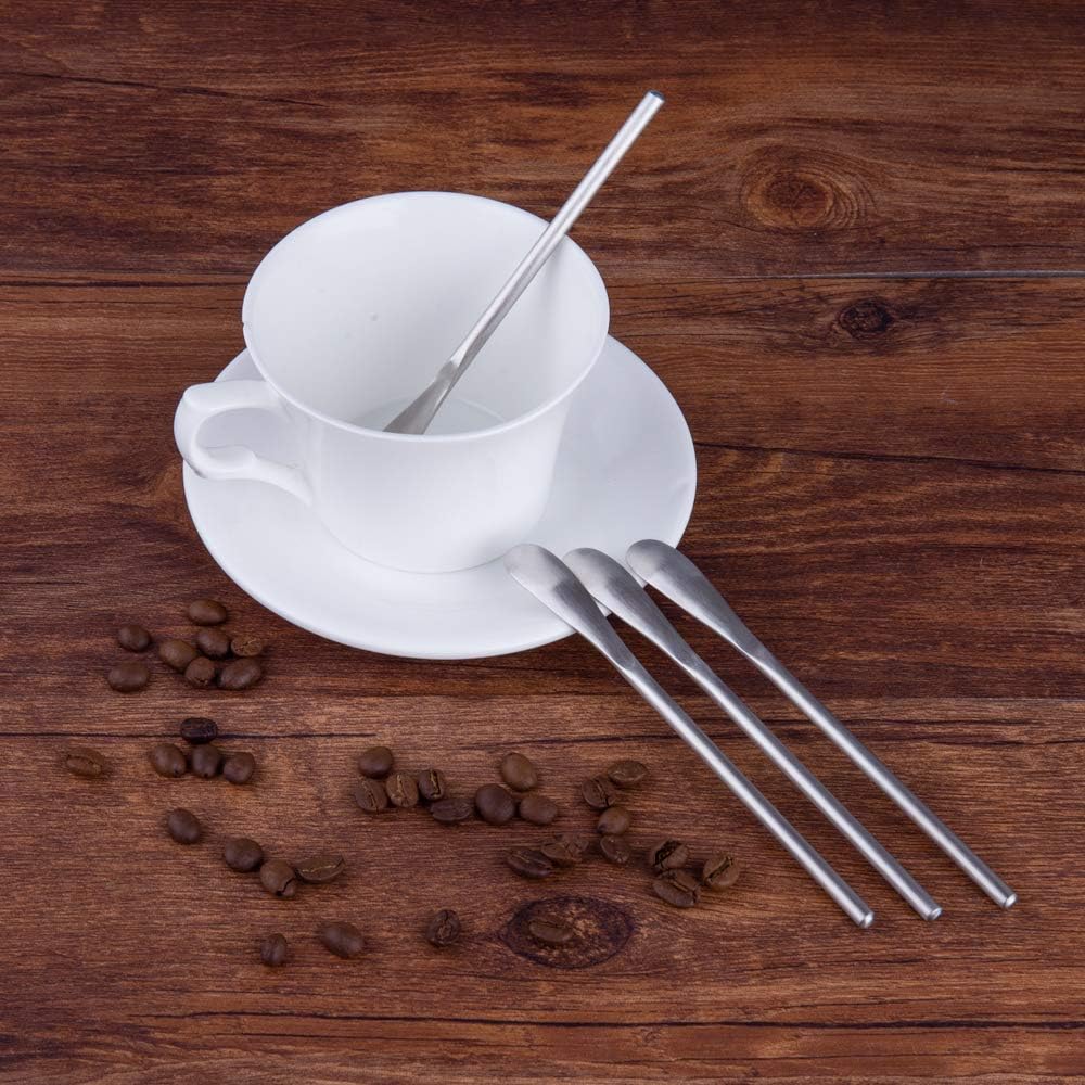 SUS304 Stainless Steel Coffee Stir Spoons placed beside drinkware on a dining table with a simple table setting