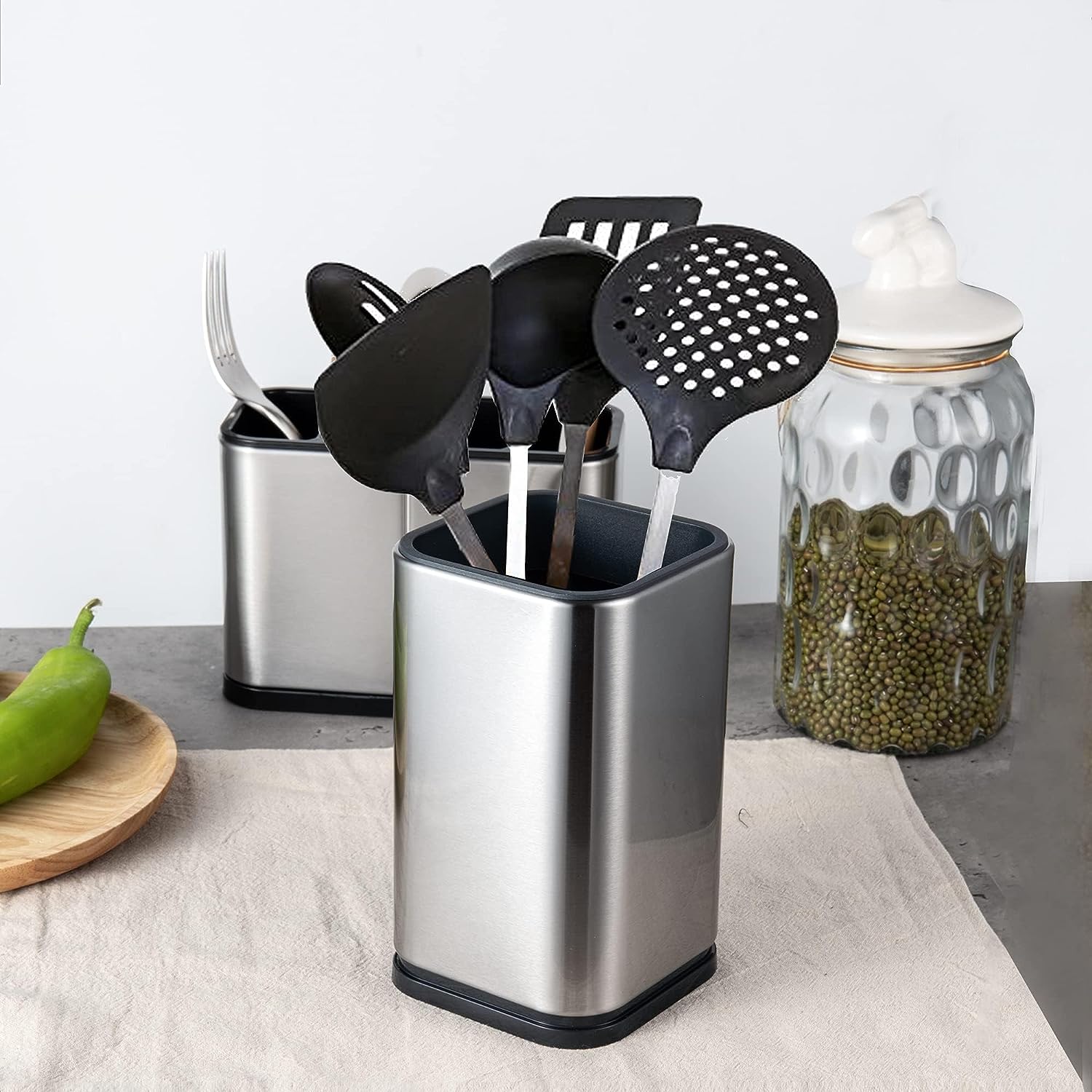 IMEEA Kitchen Utensil Caddy holding spatulas, spoons and cooking tools on a countertop for organized storage