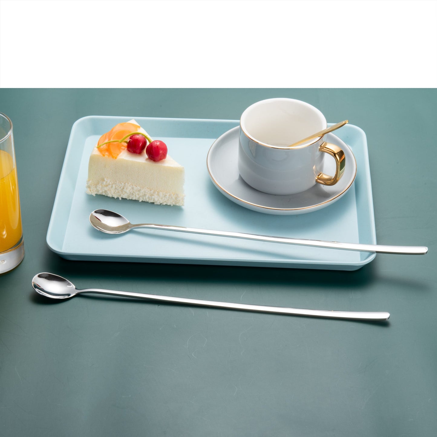 IMEEA Stainless Steel Stirring Spoon displayed near a dessert tray with cake and tea for beverage service