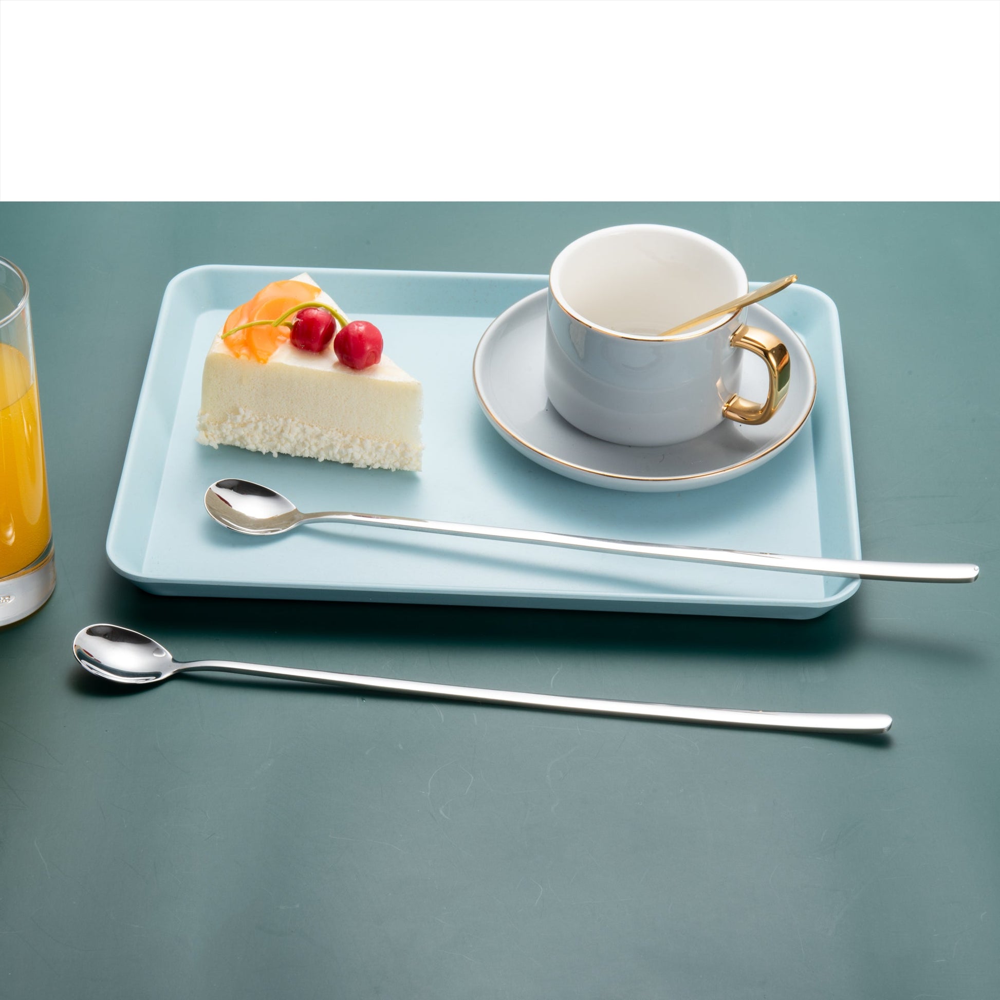 IMEEA Stainless Steel Stirring Spoon displayed near a dessert tray with cake and tea for beverage service