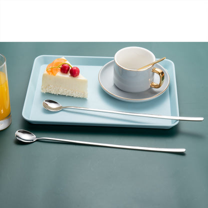 IMEEA Stainless Steel Stirring Spoon displayed near a dessert tray with cake and tea for beverage service