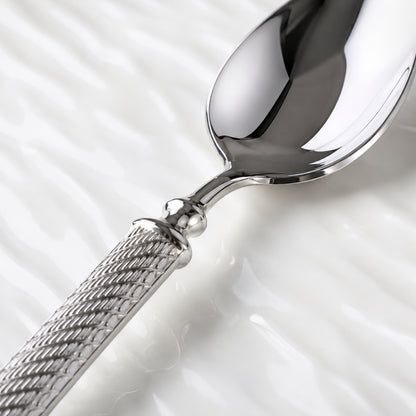 IMEEA Dinner Spoon Close-Up Featuring Refined Handle Transition, Smooth Polished Surface, and Elegant Textured Detail