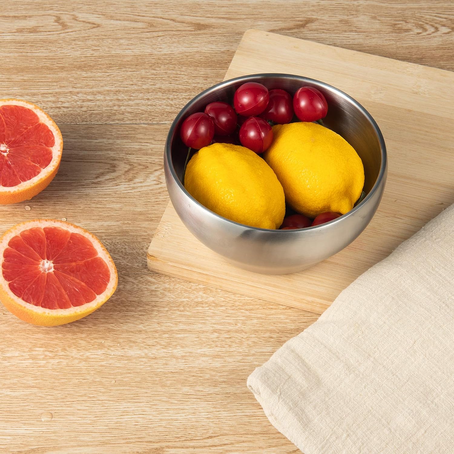 IMEEA stainless steel ice cream bowl with fruit displayed on a dining table