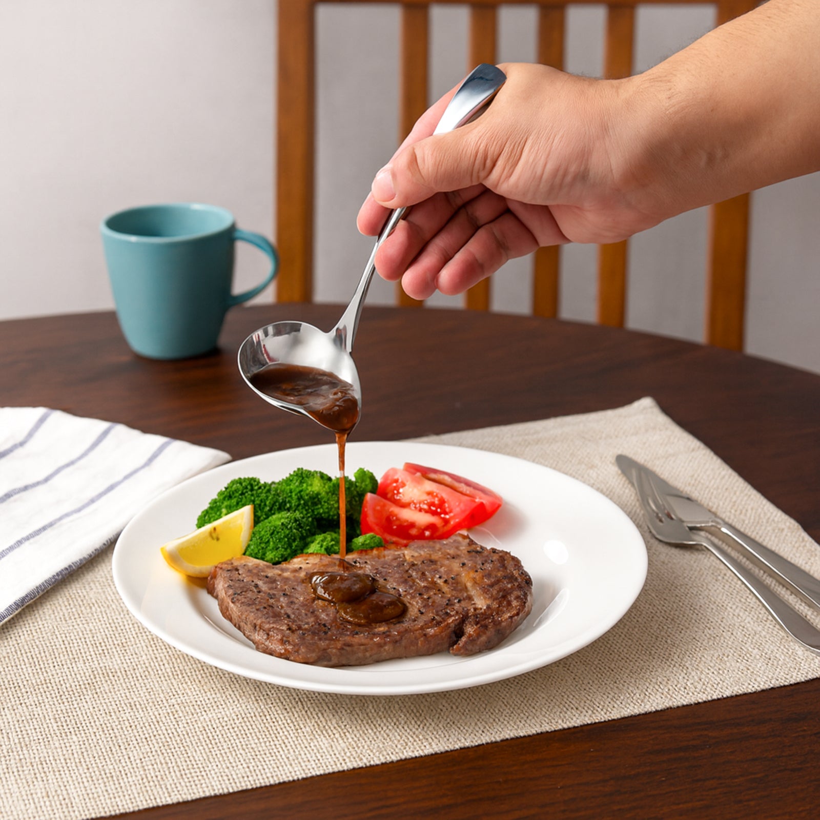 IMEEA gravy ladle with precision pouring spout pouring sauce over food