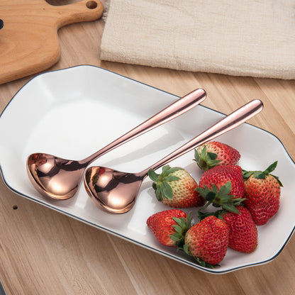 IMEEA Rose Gold Sauce Ladle displayed with fresh strawberries on a serving plate to enhance table presentation