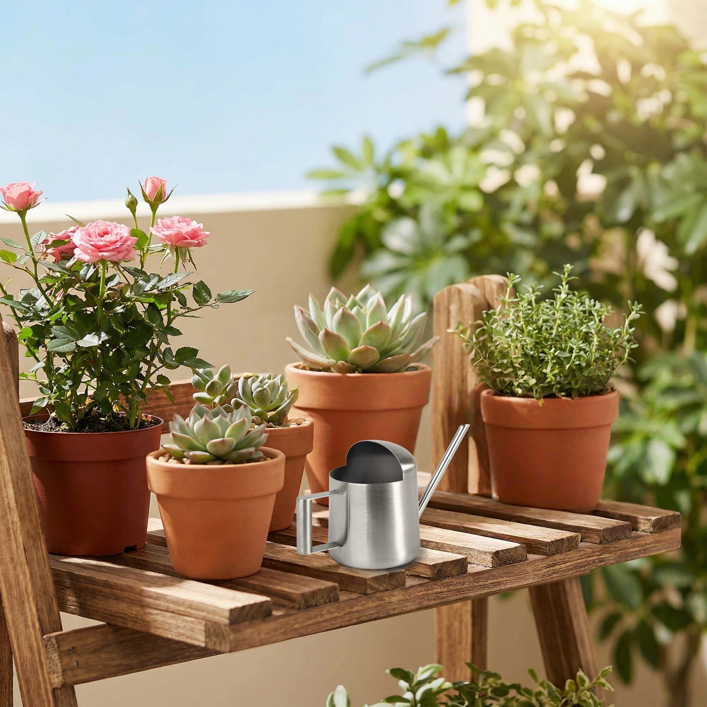 Mini Indoor Watering Can displayed among small plants on a balcony shelf for convenient plant care