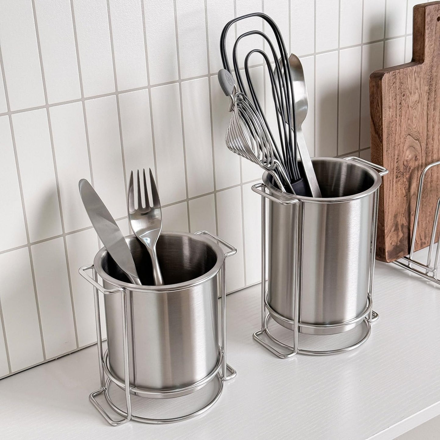 Stainless steel base improves stability and keeps the holder elevated away from countertop moisture and residue
