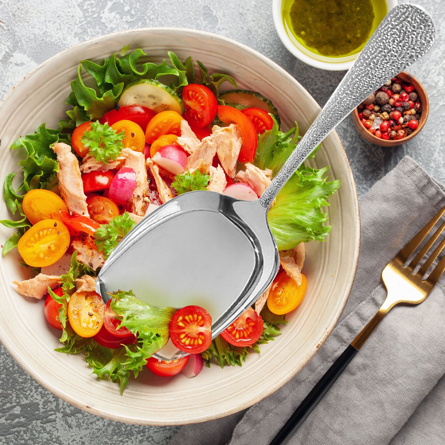 18/10 Stainless Steel Large Serving Spoon in a serving bowl for stirring and scooping food