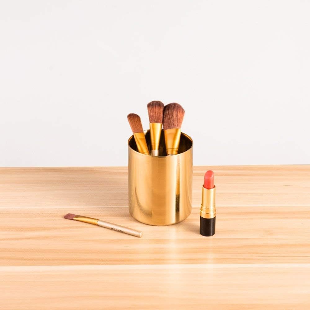 IMEEA Sleek gold makeup brush holder filled with makeup brushes for organized vanity storage