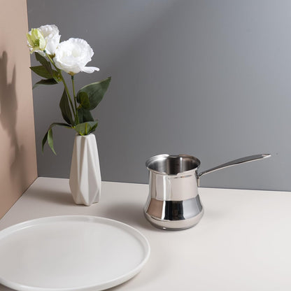 Polished IMEEA 18/10 Stainless Steel Milk Frothing Pitcher on table