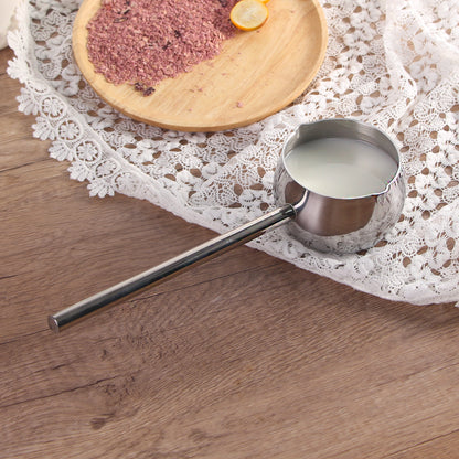 IMEEA Milk Warmer Pot filled with milk on a dining table for everyday serving