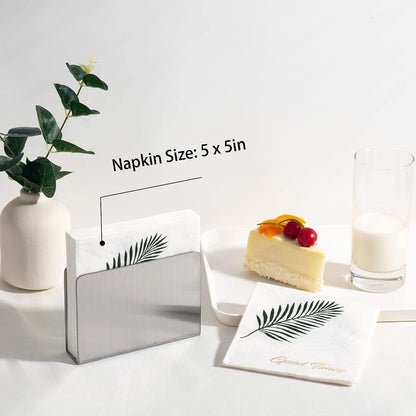 Stainless Steel Cocktail Napkin Holder with 5x5 inch beverage napkins in tabletop setting