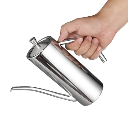 Stainless Steel Olive Oil Dispenser held by hand with comfortable grip