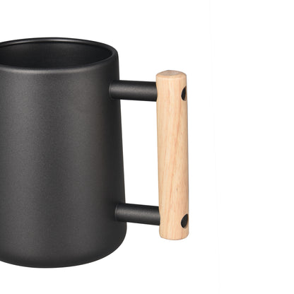 Black Stainless Steel Plant Watering Pot with wooden handle close-up detail