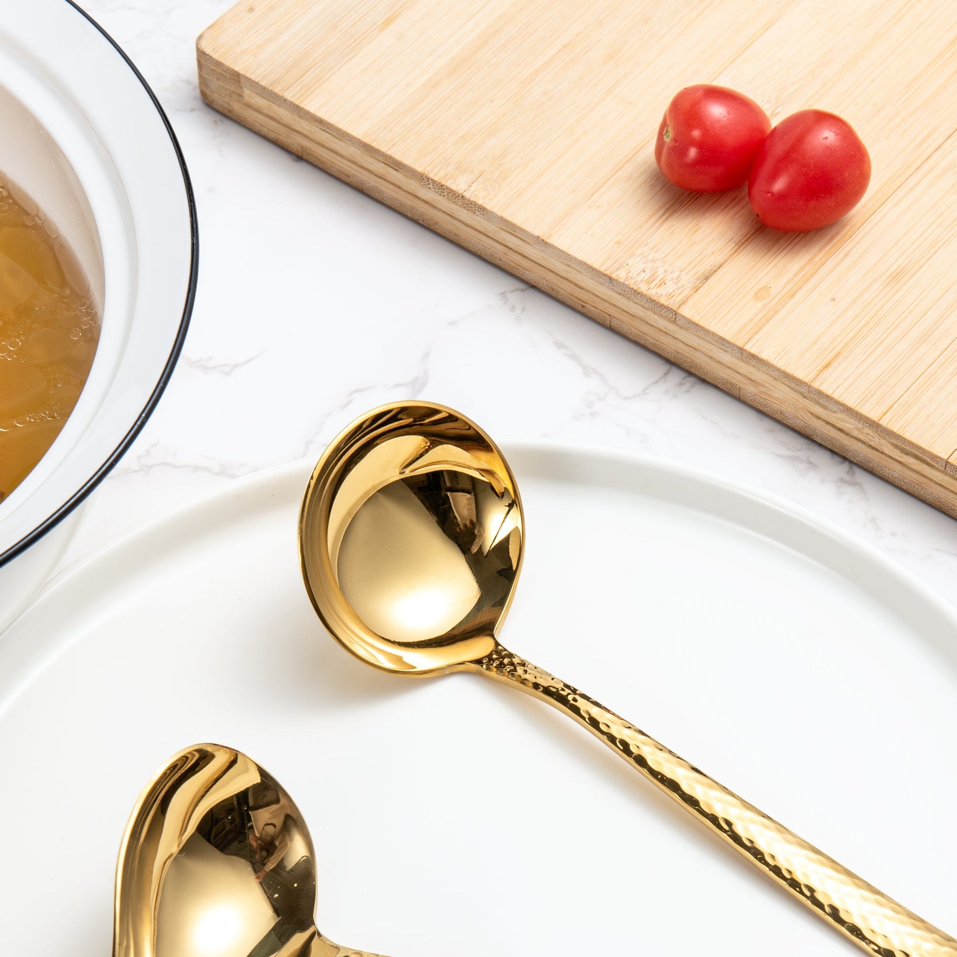IMEEA polished gold stainless steel sauce ladle close-up of smooth spoon bowl