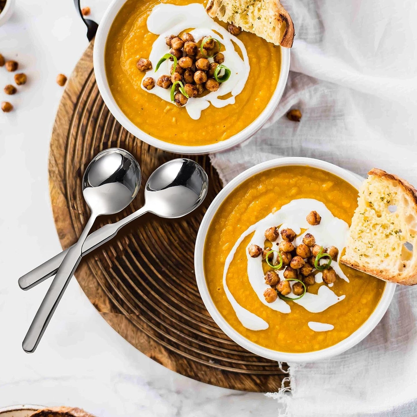 Elegant IMEEA 316 Stainless Steel soup Spoons placed on a plate for everyday dining