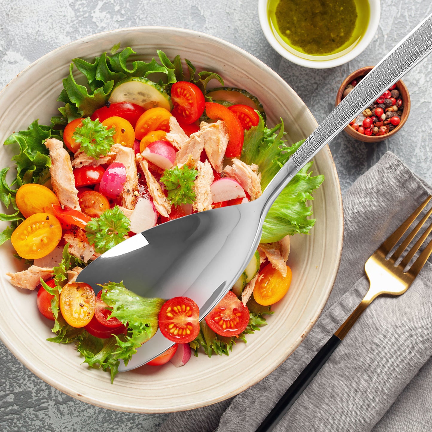 Modern Stainless Steel Buffet Spoon serving salad with a wide flat surface for easy scooping
