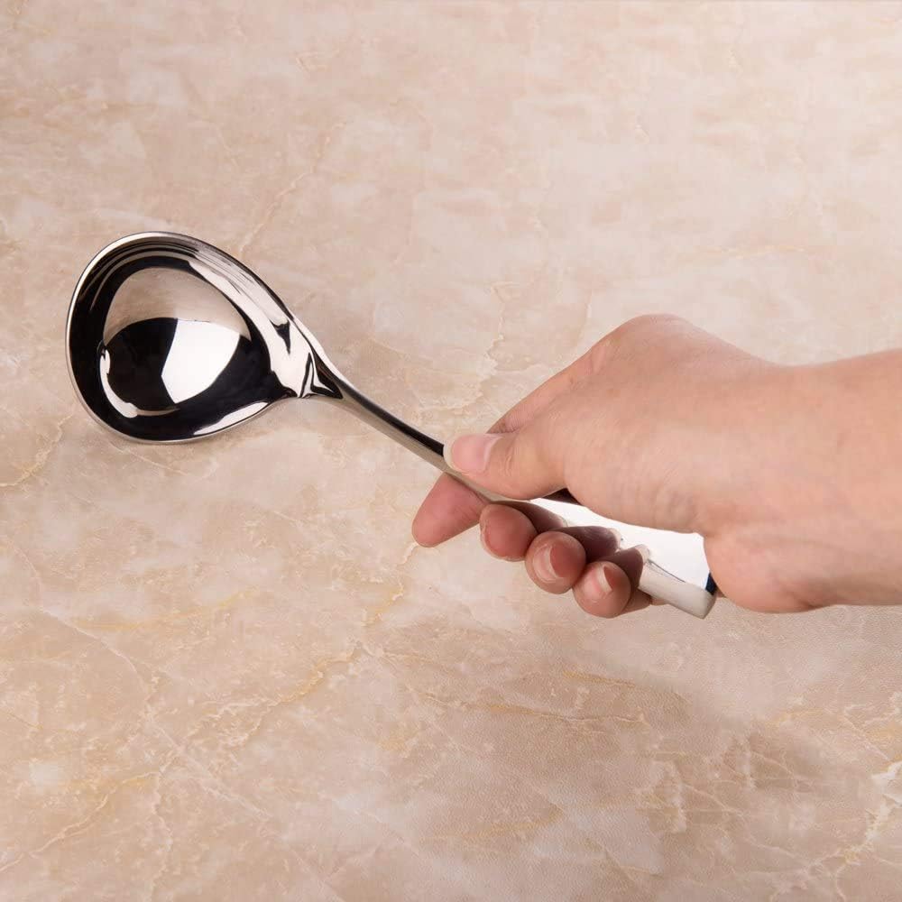 Mini Stainless Steel Sauce Ladle held by hand for serving sauces, and small portions