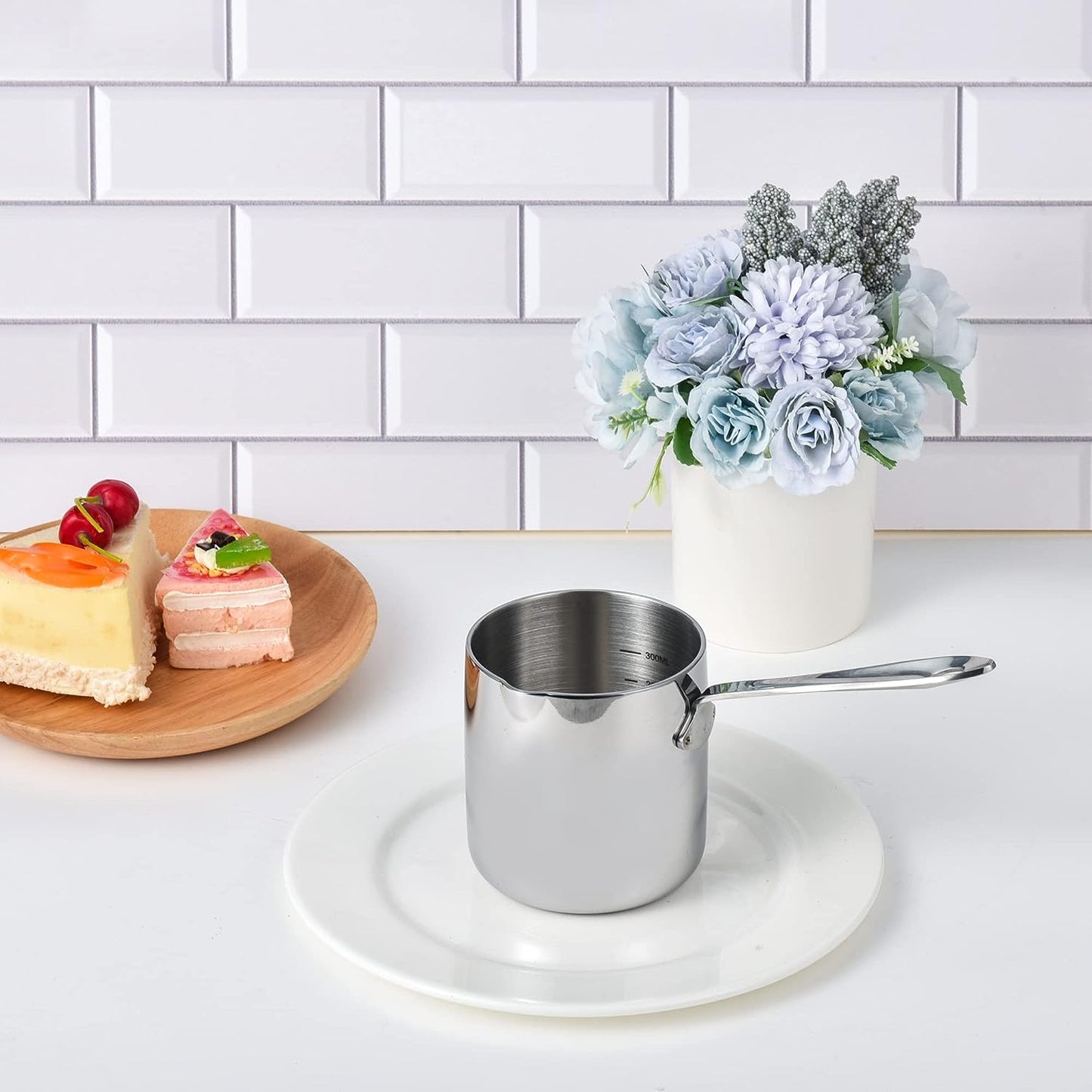 Smooth 18/10 Stainless Steel Butter Warmer placed in a home setting with a clean and simple style