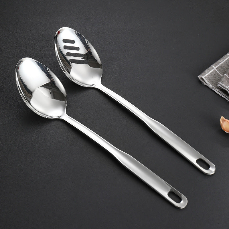 Top view of a large SUS304 stainless steel serving spoon and slotted spoon set showcasing the size and design