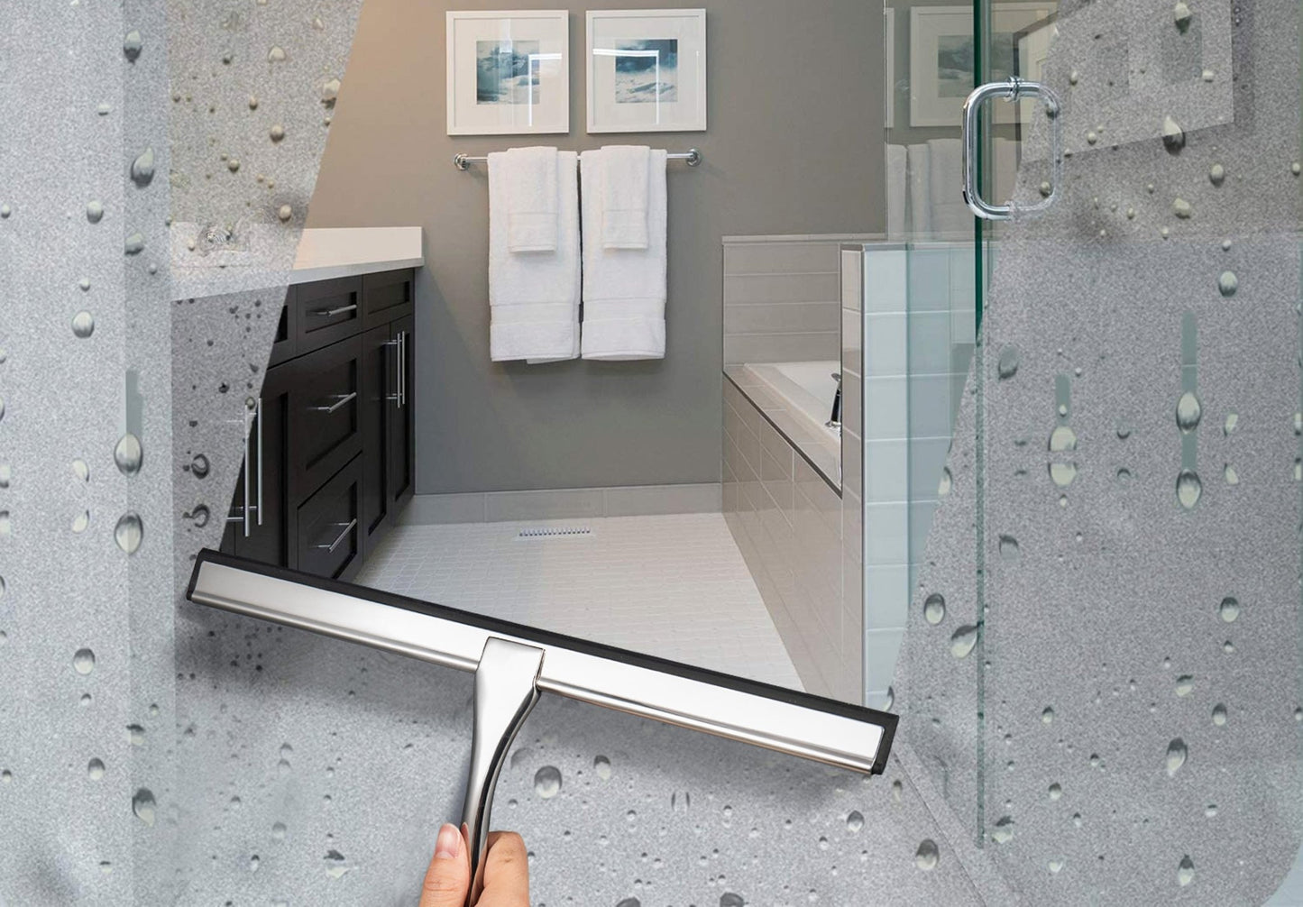 Stainless Steel Shower Squeegee cleaning water droplets from a bathroom glass door