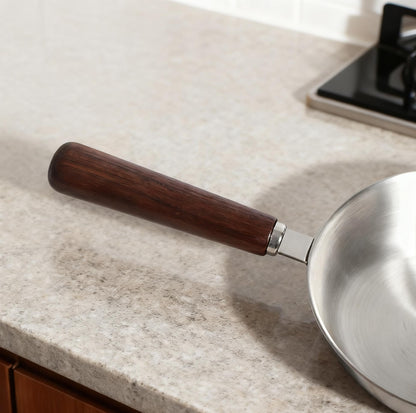 IMEEA Small Egg Pan close-up showcasing the comfortable wooden grip and refined handle appearance