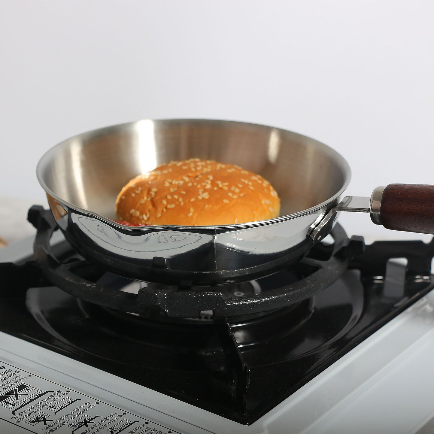 IMEEA Mini Frying Pan with hamburger bun on a stovetop for everyday cooking