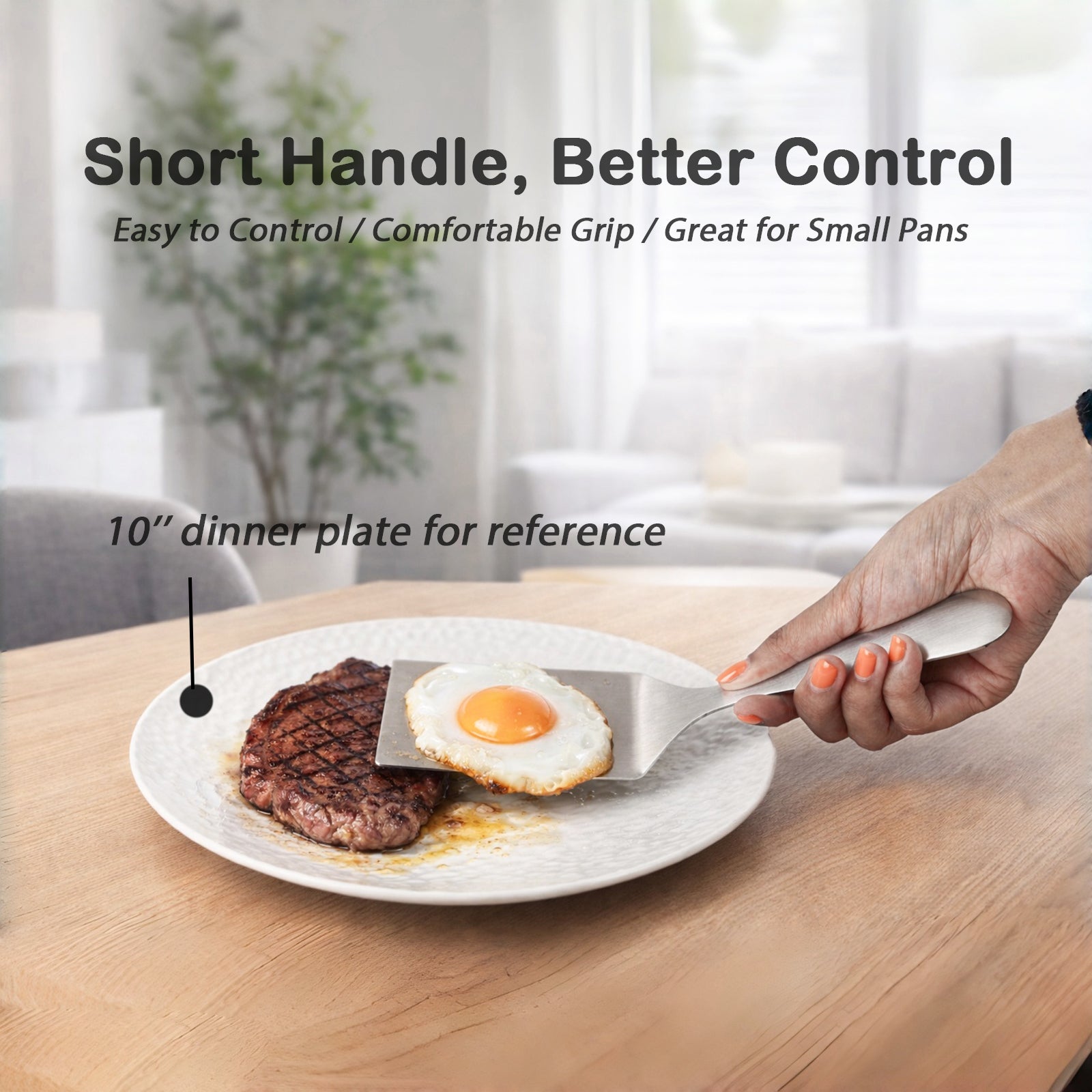 Comfortable Grip SUS304 Stainless Steel Spatula transferring a fried egg to a steak plate with short handle design