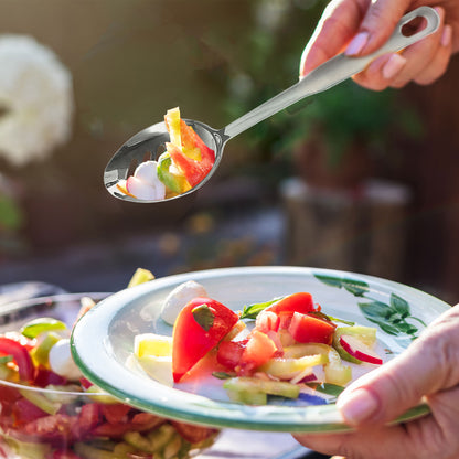 Precision slotted stainless steel spoon with fine slots for serving food and efficiently draining excess oil
