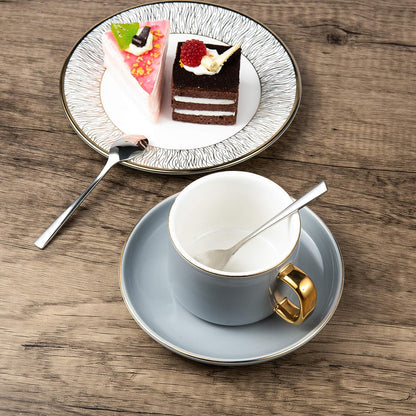 Elegant demitasse spoons with mirror polished finish arranged with tableware on a dining table