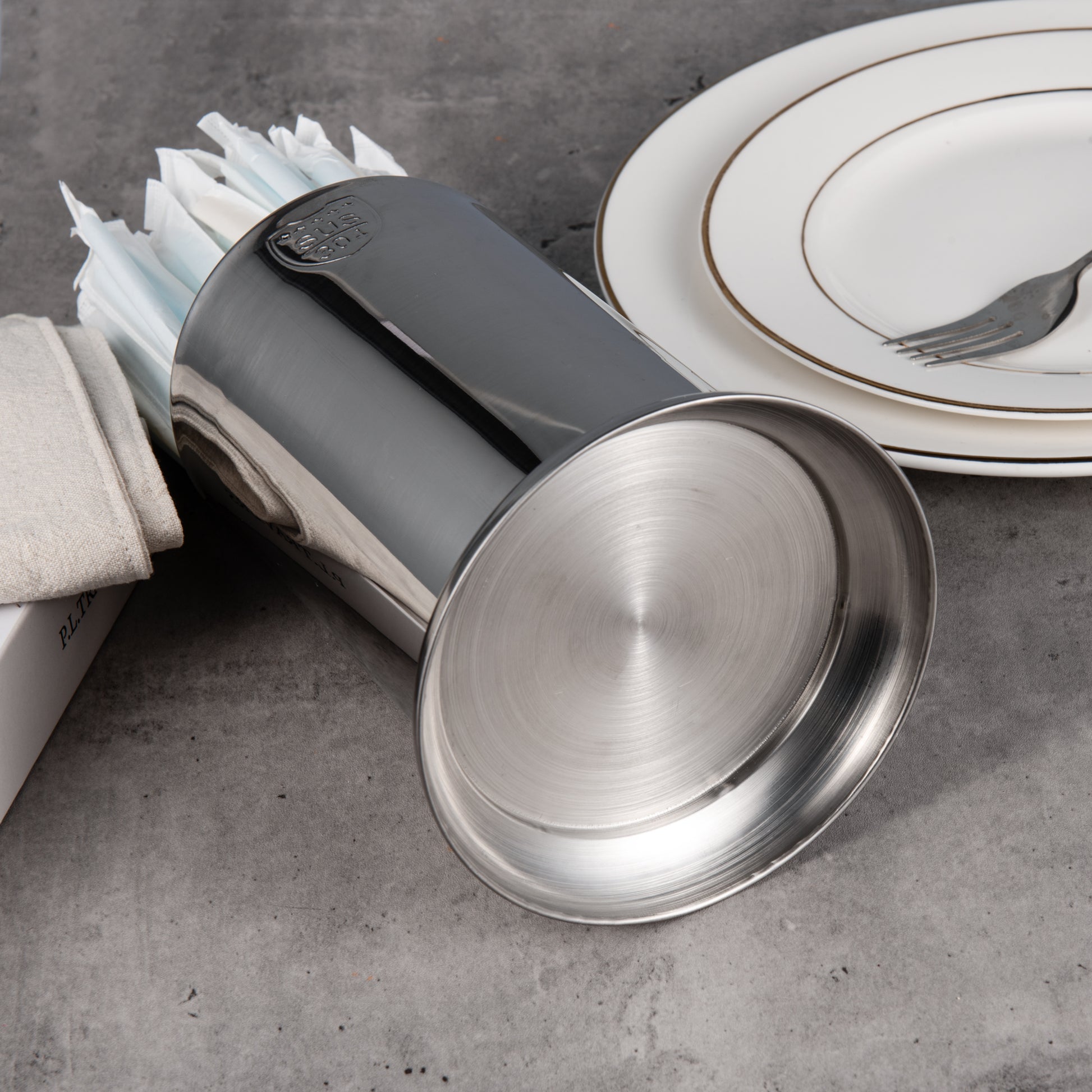 Stainless Steel Straw Holder bottom detail showing polished surface and stable base design