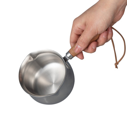 IMEEA Super  Mini Stainless Steel Sauce Pan with Comfortable Wooden Handle shown in hand