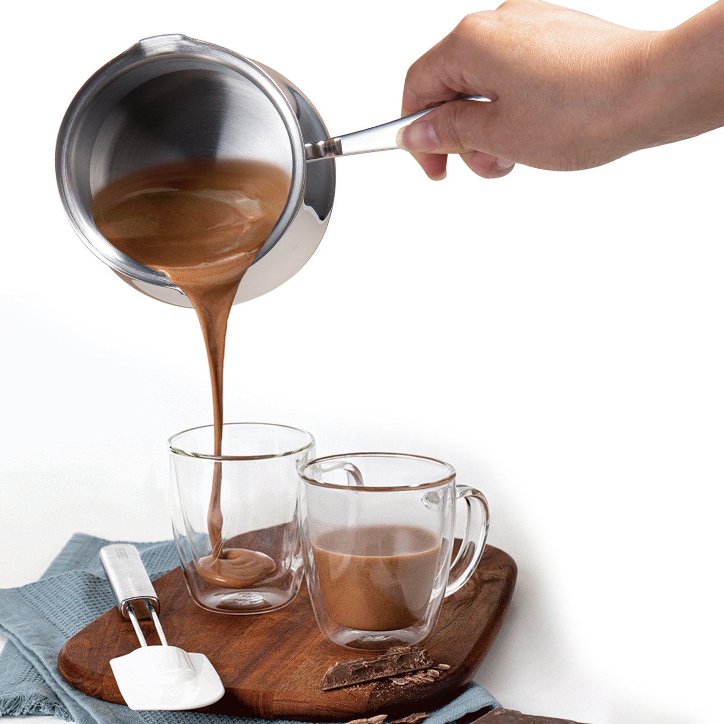 IMEEA 18/10 Stainless Steel Turkish Coffee Pot pouring coffee into a glass cup