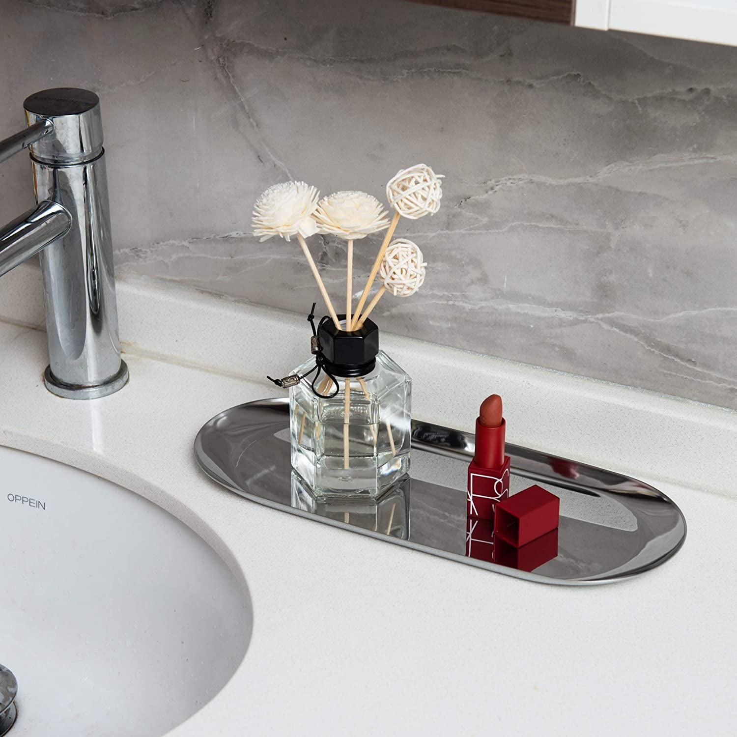 Stainless Steel Vanity Tray with aromatherapy diffuser beside bathroom sink