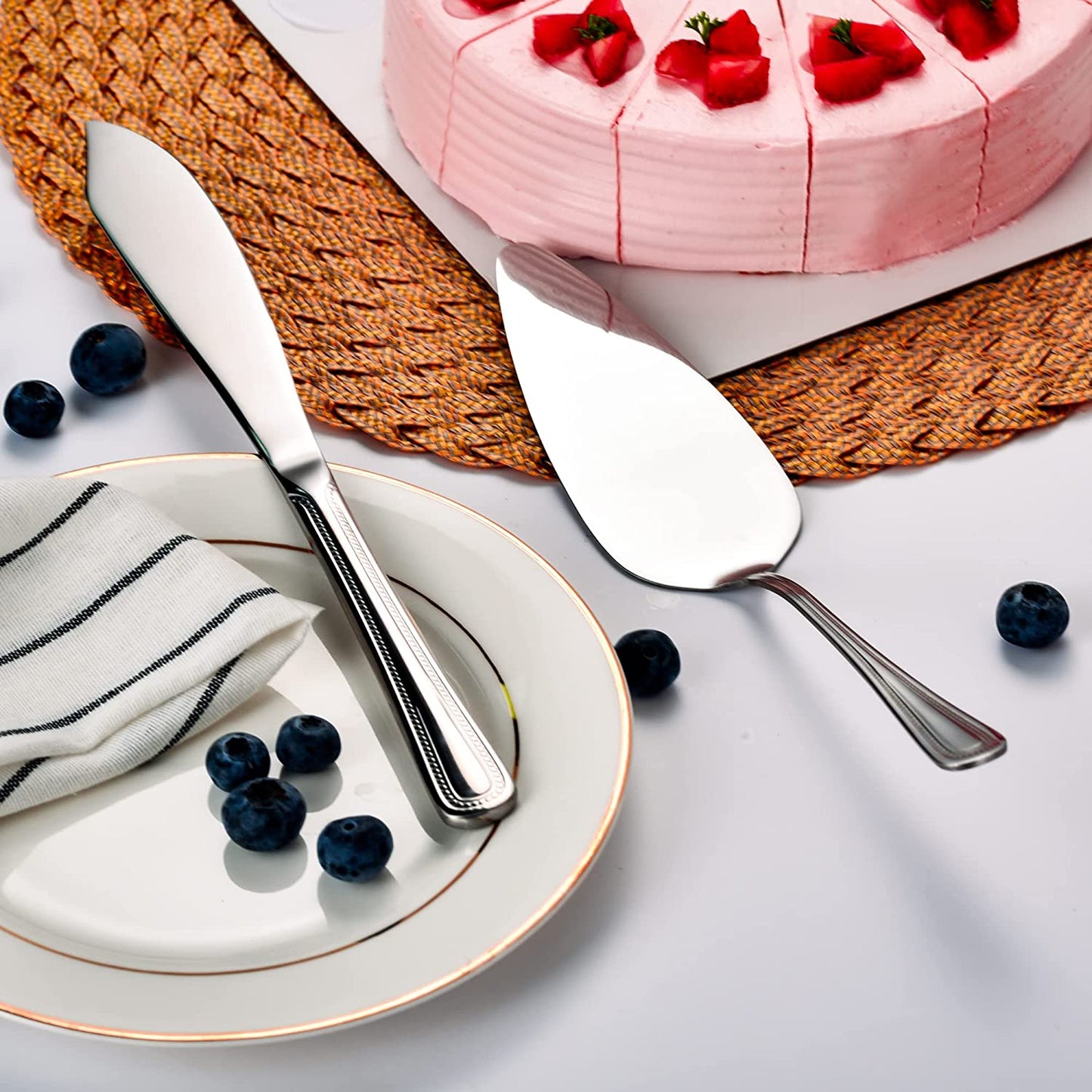 Stainless Steelcake knife and server set placed beside a cake for dessert serving and celebrations