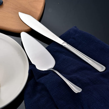 IMEEA cake knife and server set placed beside a plate, showcasing the two-piece set design