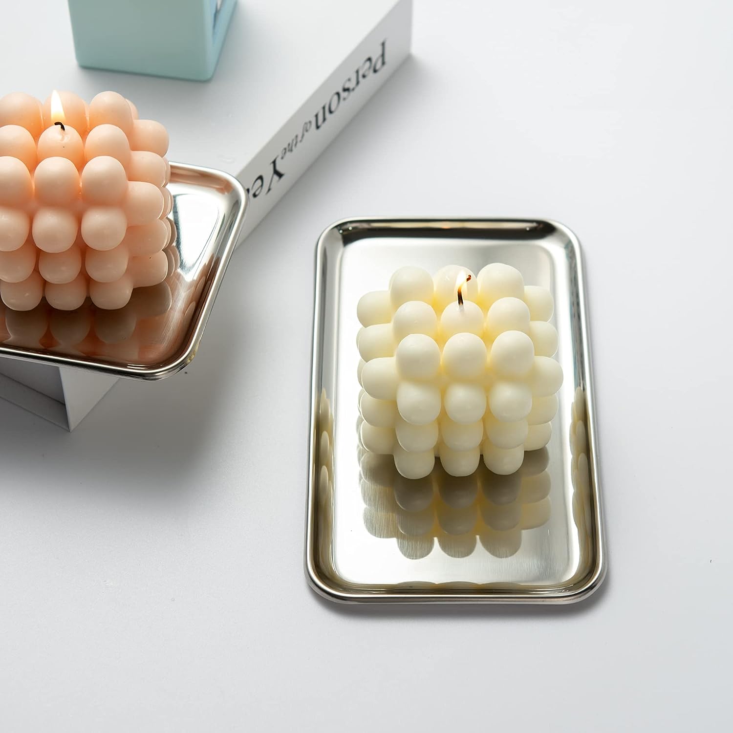 Elegant SUS304 Stainless Steel Serving Tray holding candles in a home decor setting