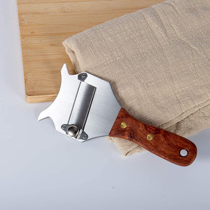 Stainless Steel Chocolate Slicer with Wood Handle used on a kitchen cutting board