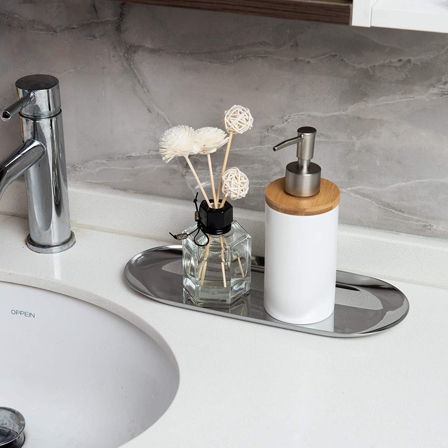 Stainless Steel Vanity Tray with aromatherapy diffuser and hand soap dispenser beside bathroom sink